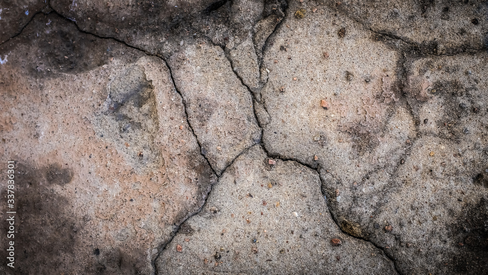 Poster old stone wall with a crack. texture for design