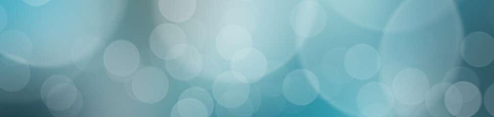 Blue panoramic bokeh lights abstract background.