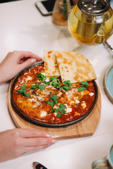 scrambled eggs with flatbread and tea