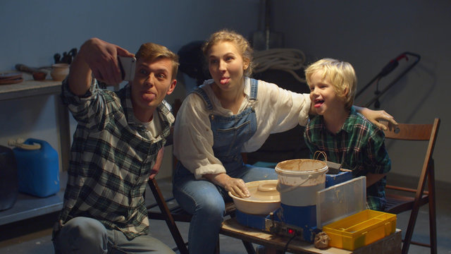 Family having fun making selfie
