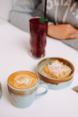 cup of coffee and cookies
