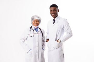 Two doctors on a white background. Indian woman with a phonendoscope.African man.