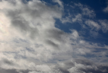 Fototapeta na wymiar Light white clouds in the blue sky.