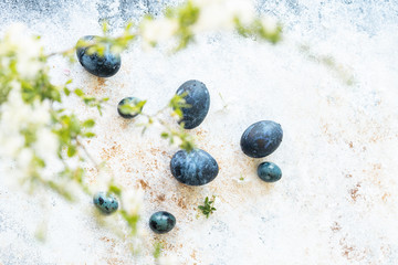 Beautiful eggs for Easter and for Breakfast on a grey background. The concept of spring and healthy food.