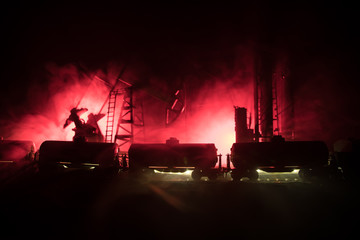 Train moving in fog. Ancient steam locomotive in night. Night train moving on railroad. orange fire background. Horror mystical scene