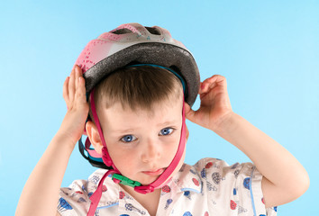 Boy with a crash helmet. Safety, child.