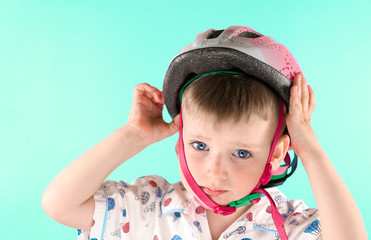 Boy with a crash helmet. Safety, child.