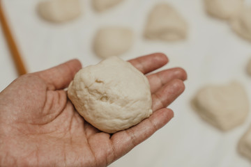 Muslim woman in isolation making bread for meal during holy month Ramadan