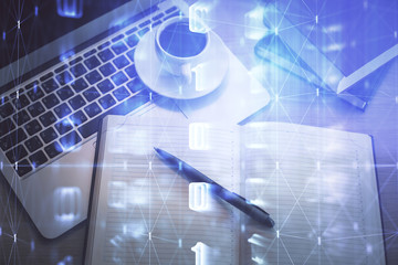 Multi exposure of data theme drawing hologram over topview work desk background with computer. Concept of technology.