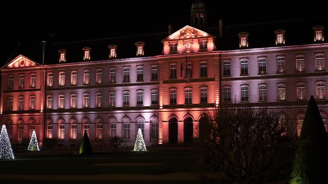 France, city hall of Caen in Basse Normandie at night. Footage 4k 25ftp. Light illumination on the building