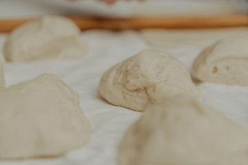 Muslim woman in isolation making bread for meal during holy month Ramadan