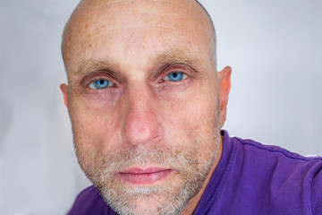 Man waching into the camera