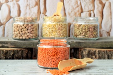 
background of edible pulses in a glass jar