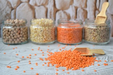 
background of edible pulses in a glass jar