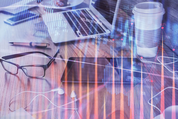 Double exposure of forex chart drawing and cell phone background. Concept of financial trading