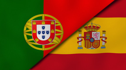The flags of Portugal and Spain. News, reportage, business background. 3d illustration