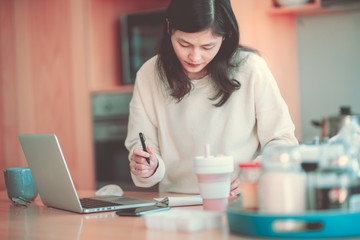 Fototapeta premium Asian woman work from home concept images