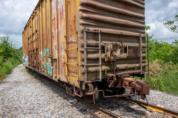 Fototapeta na wymiar old train car with graffiti