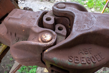 close up of coupler on train cars