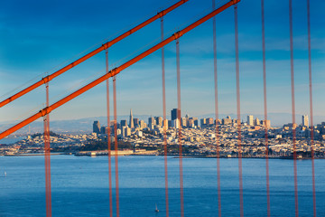 A view of the San Francisco, California skyline, looking through the Golden Gate Bridge.