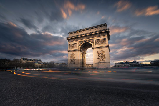 World famous Arc de Triomphe at the city center of Paris, France.	