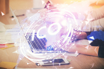 Double exposure of woman hands typing on computer and crypto market theme hologram drawing....