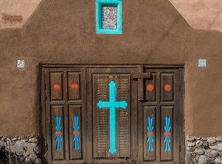 Ornate Carved Gate On Pueblo Style Building In Espanola, New Mexico, USA