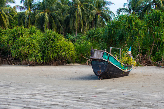 Old boat in the sea beach