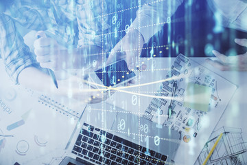 Double exposure of data theme hologram drawing and man and woman working together holding and using a mobile device.