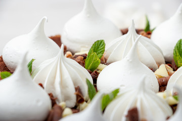white marshmallows on a cake close-up