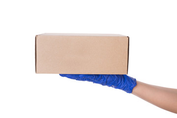 Safe delivery concept. Side profile close up photo of hand holding carton craft paper parcel isolated over white background with empty space