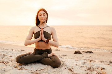 Fototapeta na wymiar yoga meditation sunset nature girl woman calm asana sea