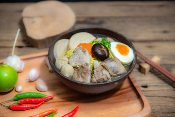 Chinese homemade pork soup noodle with egg, mushroom, pork balls, chilli, garlic , very yummy.