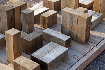 wooden blocks of different sizes and heights