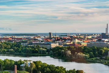 European Helsinki cityscape on a clear beautiful day photographes over the waterway. 