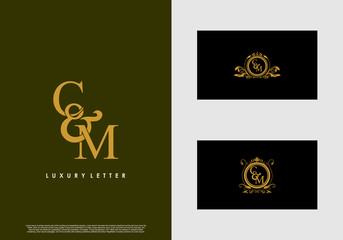 CM logo initial vector mark. Gold color elegant classical symmetric curves decor.