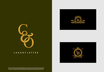 CO logo initial vector mark. Gold color elegant classical symmetric curves decor.