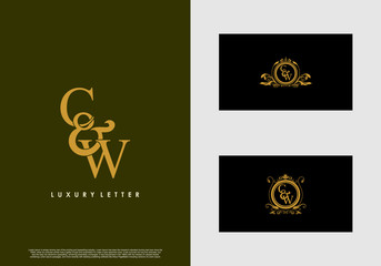 CW logo initial vector mark. Gold color elegant classical symmetric curves decor.