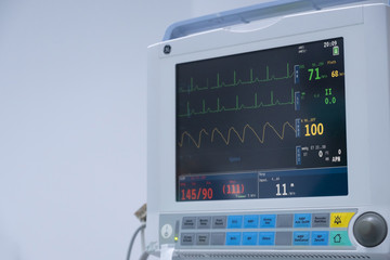 The Vital signs monitor in operating room in hospital. Vital signs monitor using for measure pulse oximetry, non-invasive blood pressure, temperature, EtCo2, respiration and etc.