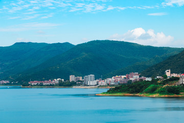 Fototapeta premium Mountains by the lake. The background material of Chinese painting.