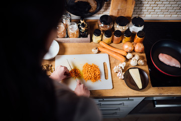 Cutting fresh vegetables.Ingredients for cooking food with carrots.Healthy food for strong immune system.Health benefits.Preparing carrots for cooking.Julienne,cube,dice vegetables.Meal preparation