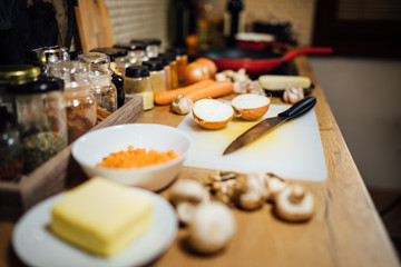 Cutting fresh vegetables.Ingredients for cooking food with onions.Healthy food for strong immune system.Health benefits.Preparing veggies for cooking.Julienne,cube,dice vegetables.Meal preparation