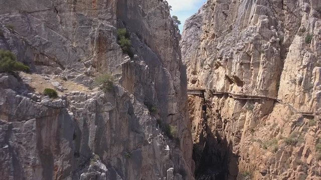 Drone view of - The King's Little Path Way - "El Caminito del Rey" in El Chorro gorge , one of the most dangerous footpaths, a famous touristic destination in south of Spain, Malaga , Costa del Sol