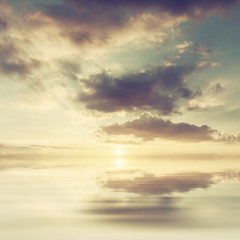 Background with sunset above sea