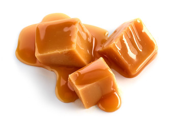 caramel pieces on white background