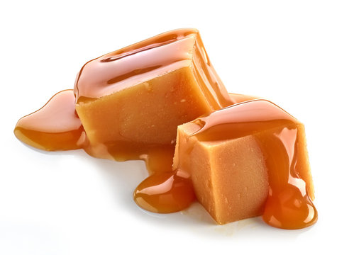 caramel pieces on white background