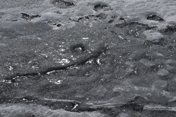 Melting ice with a ribbed surface.