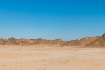 Fototapeta na wymiar View of Arabian desert and mountain range Red Sea Hills in Egypt