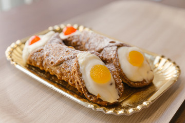 Milan, Italy - traditional Italian dessert large size cannoli witch ricotta cheese