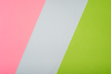 Minimalistic template with a geometric background from multi-colored sheets of paper with a fine texture. Layout for brochures, book covers, magazines, invitations or presentations.